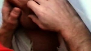 Filling the cocksucker’s mouth at the homemade glory hole