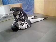 gasmasked skeleton defeats his white dummy