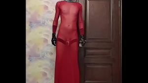 sissy crossdresser posing in transparent dress