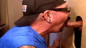 Dirty mature deepthroating in gloryhole