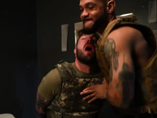 Buck on a dirty mattress inside a jail cell